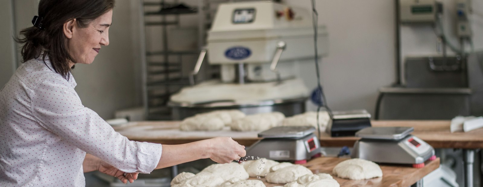 A baker at work in her bakery